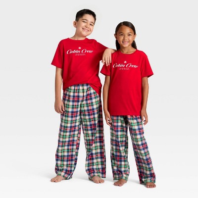Kids' Plaid Microfleece Holiday Matching Family Pajama Pants - Wondershop™ Cream