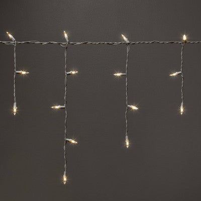  70ct LED Christmas Icicle Lights With White Wire - Wondershop™